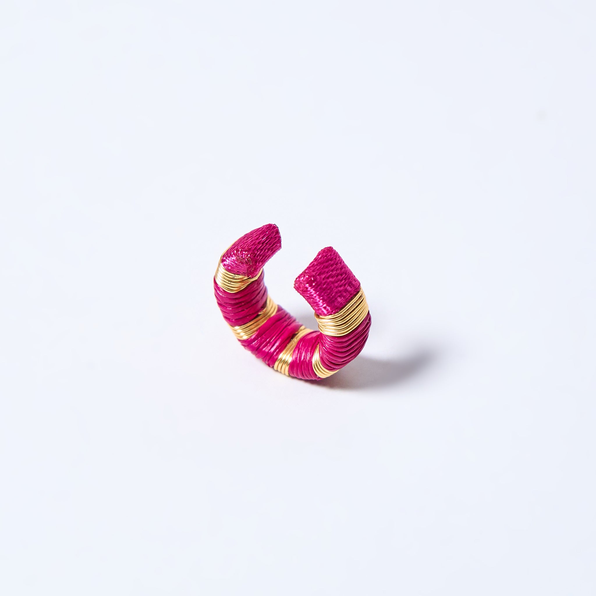 Handmade ear cuff striped in gold and fuchsia pink