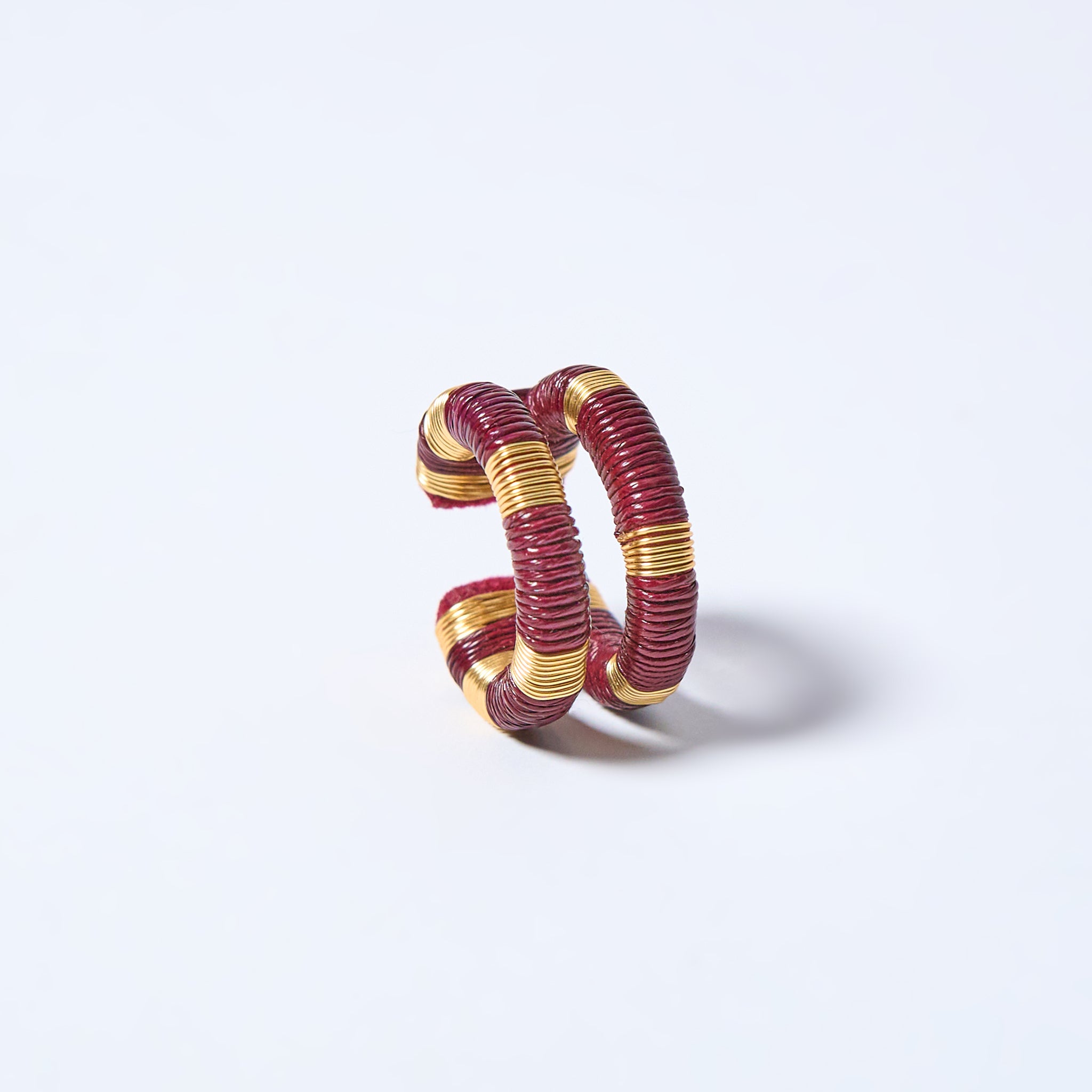 Handmade ear cuff striped in gold and wine red
