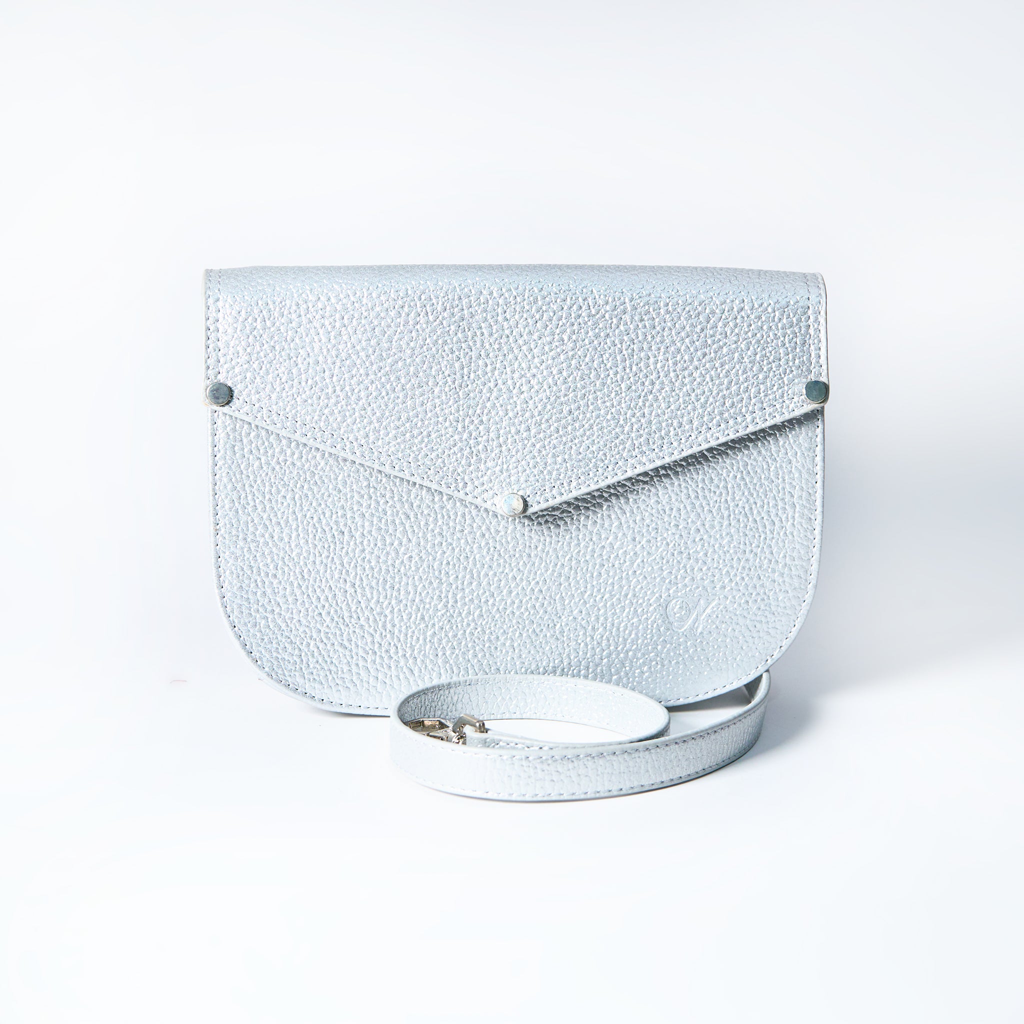 Lyra convertible leather crossbody bag in Stardust Grey with adjustable strap, can be worn as a shoulder bag, crossbody, or belt bag. Handcrafted by Oda Nova