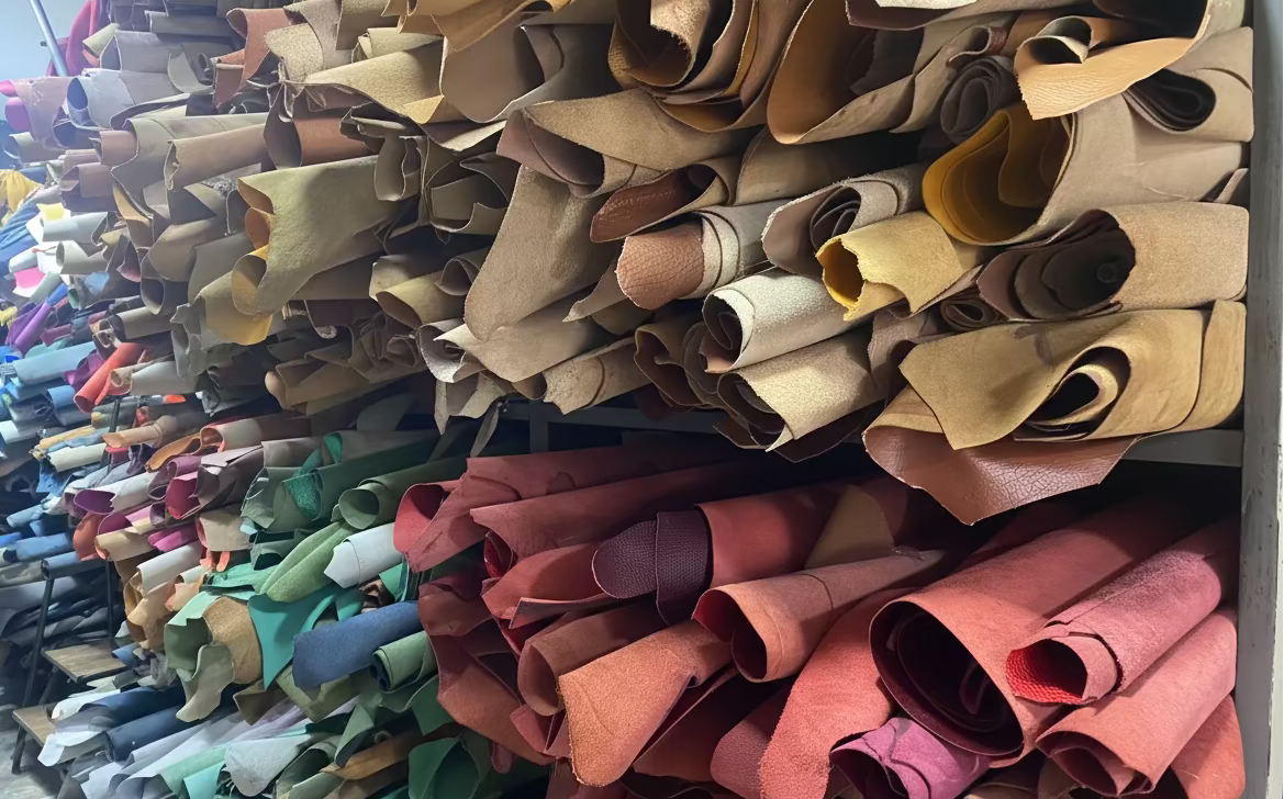 Stacks of colorful leather samples arranged in rows.