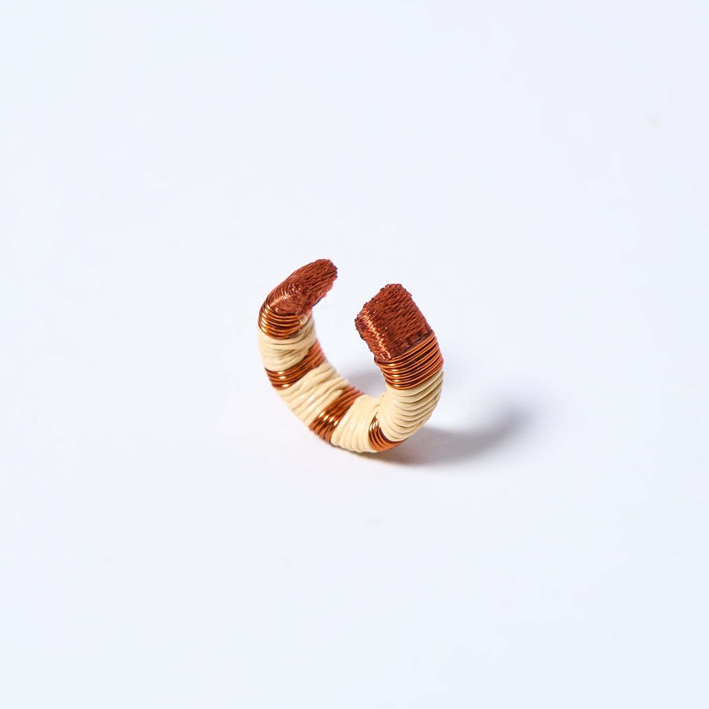 Handmade ear cuff striped in copper and cream