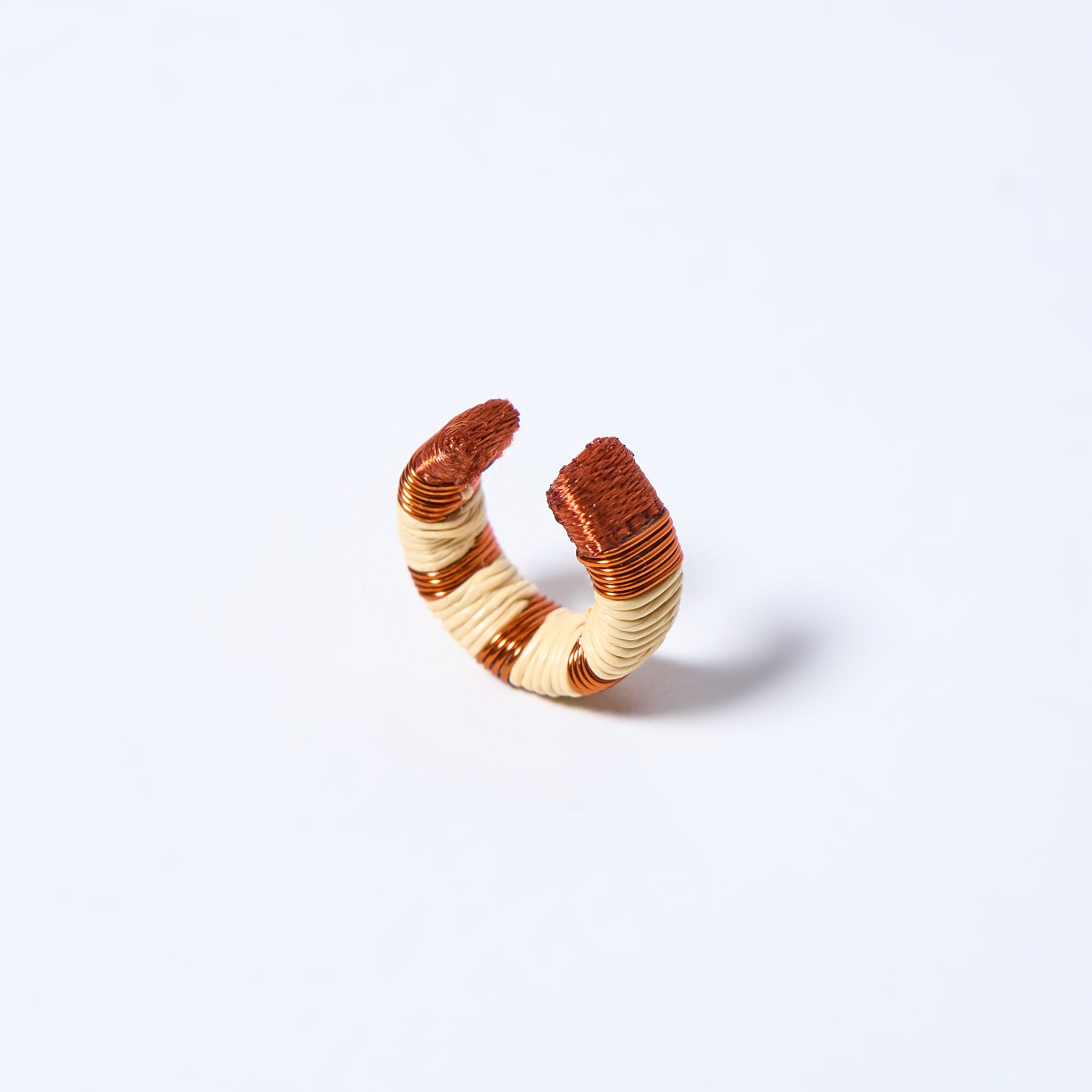 Handmade ear cuff striped in copper and cream