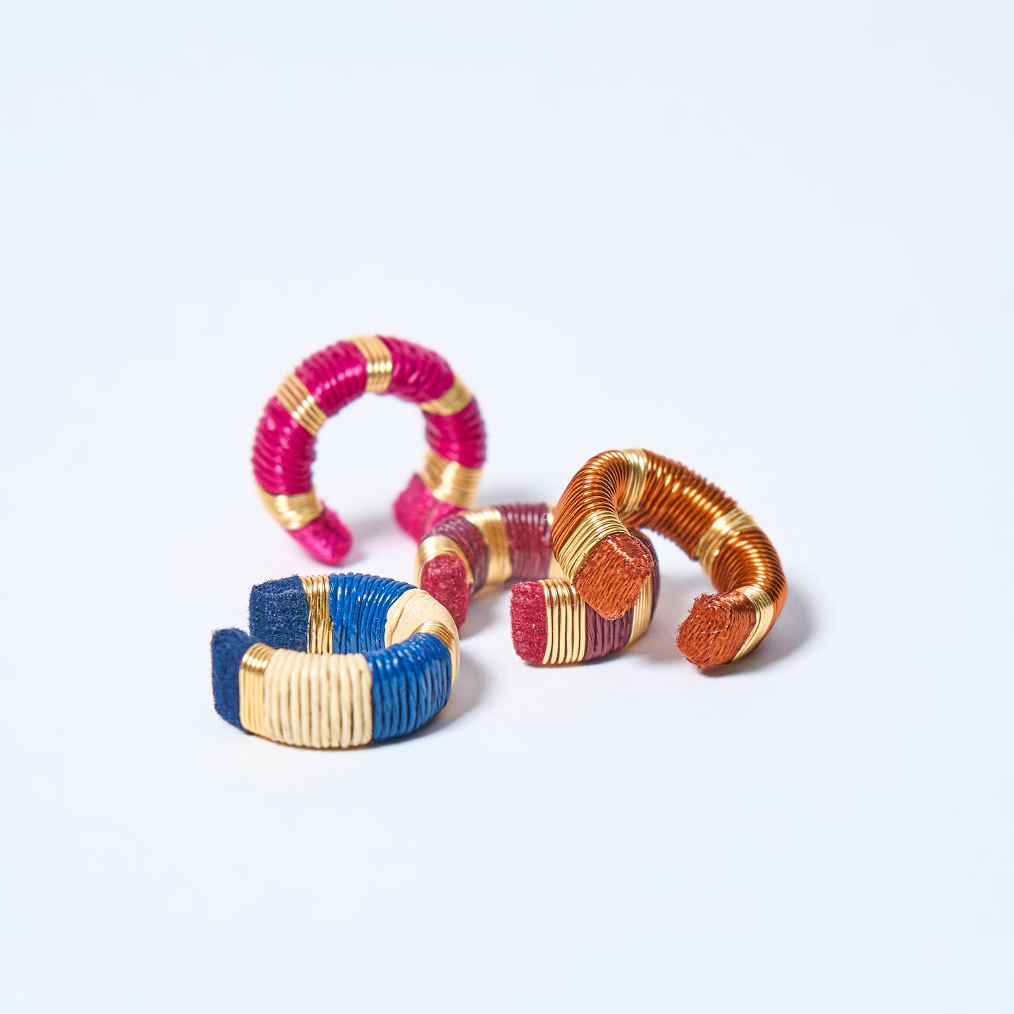 Handmade ear cuffs set striped in copper, gold, cream, blue, pink and fuchsia