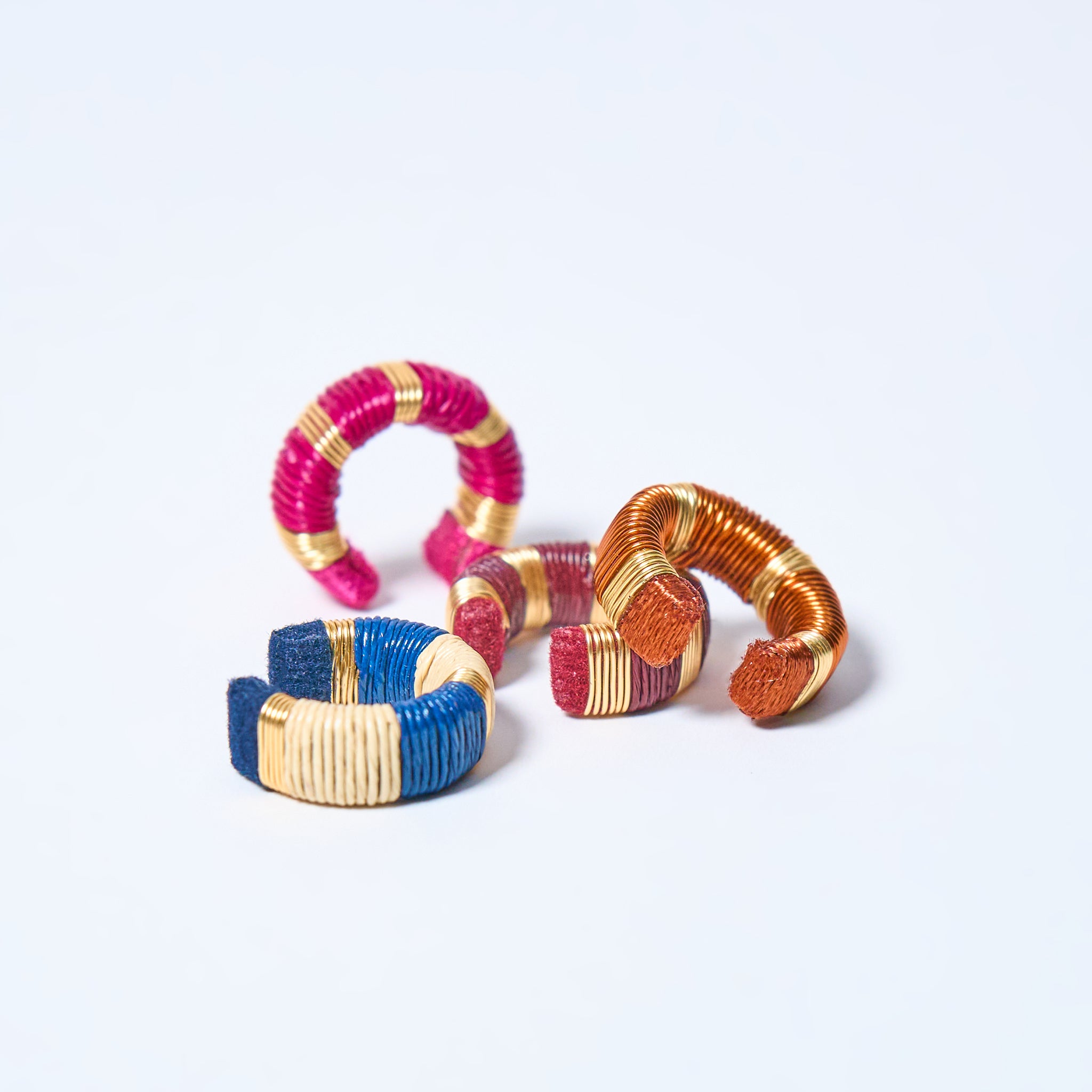 Handmade ear cuffs set striped in copper, gold, cream, blue, pink and fuchsia