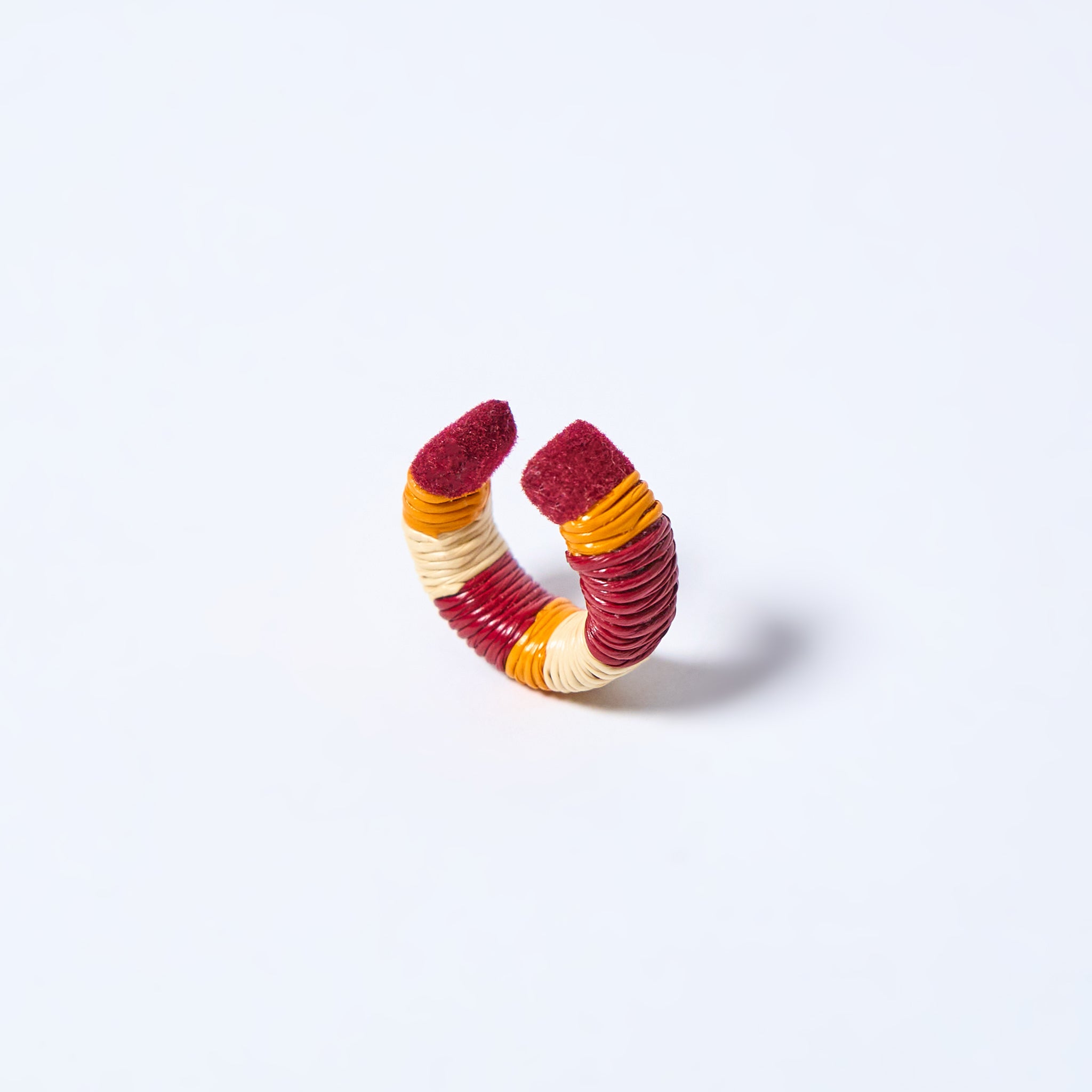Handmade ear cuff striped in mustard, wine red and cream