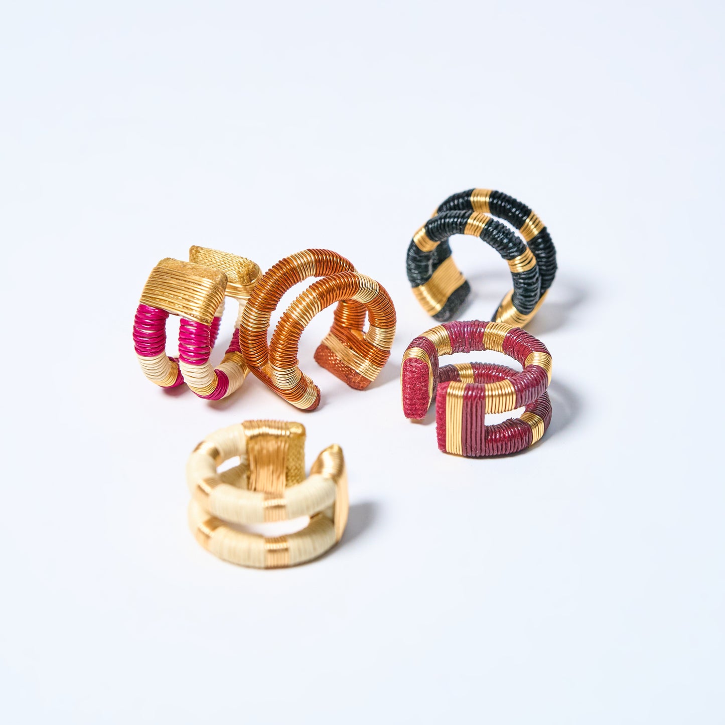 Handmade ear cuffs set striped in copper, gold, cream, black, pink and fuchsia