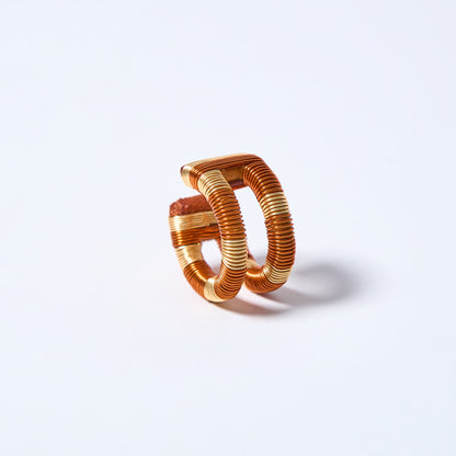 Handmade ear cuff striped in gold and copper