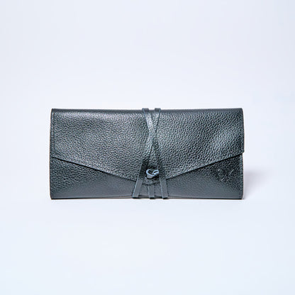 Black Onyx leather wallet on a light gray background. handcrafted by Oda Nova with space for 8 cards and bills