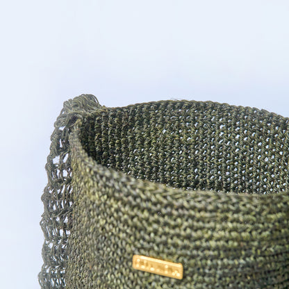 Close-up Gaia crossbody bag Orbital Jade handcrafted from natural fique fiber, designed by Oda Nova to honor feminine strength and Colombian craftsmanship