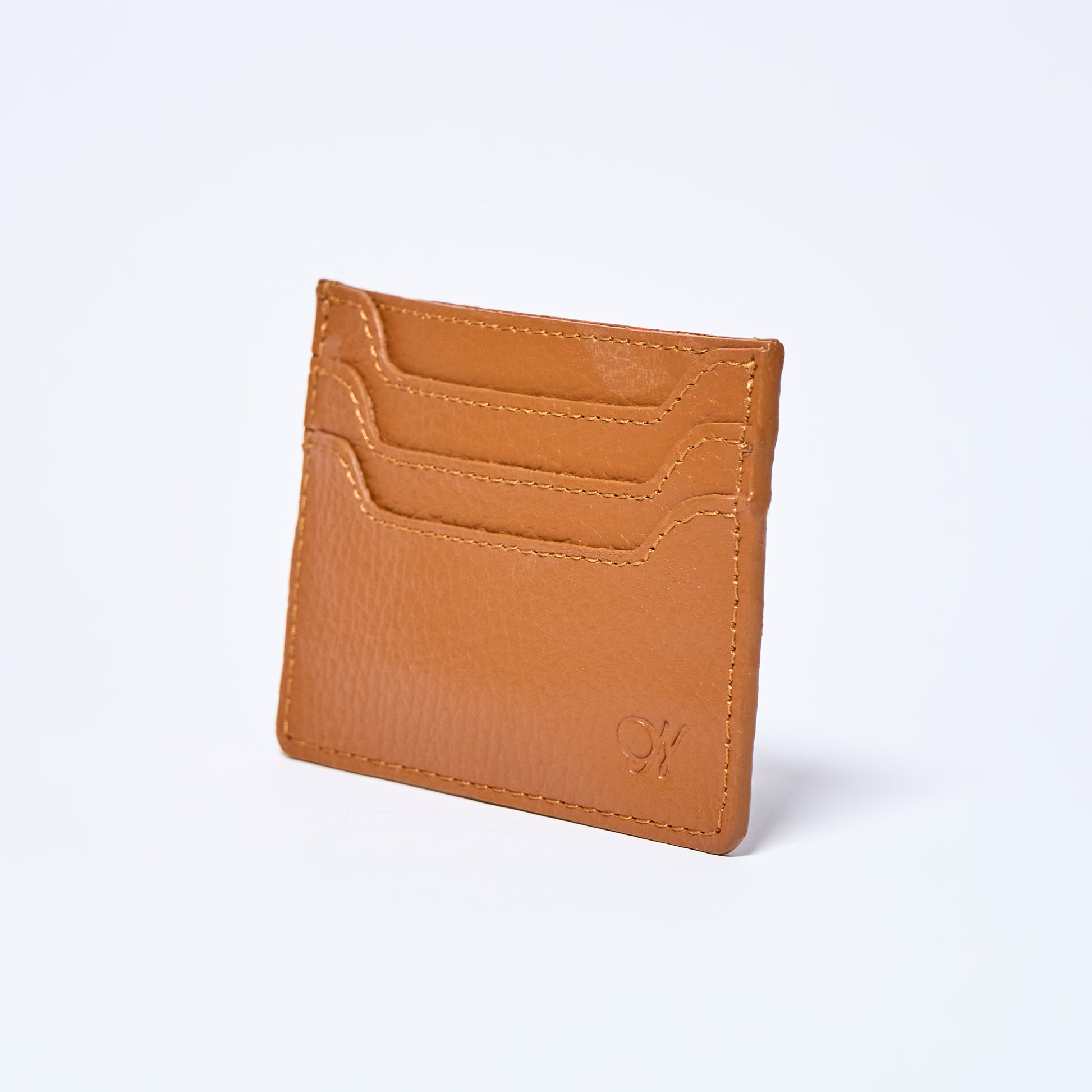 Honey Brown Celeste slim leather wallet handcrafted by Oda Nova with 6 card slots, sleek and minimalist design
