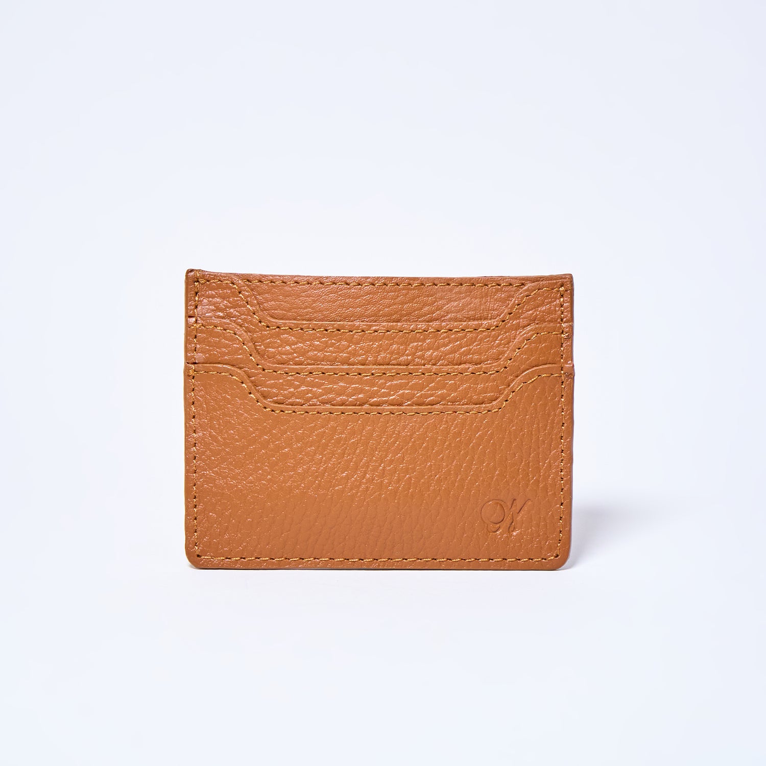 Honey Brown Celeste slim leather wallet handcrafted by Oda Nova with 6 card slots, sleek and minimalist design