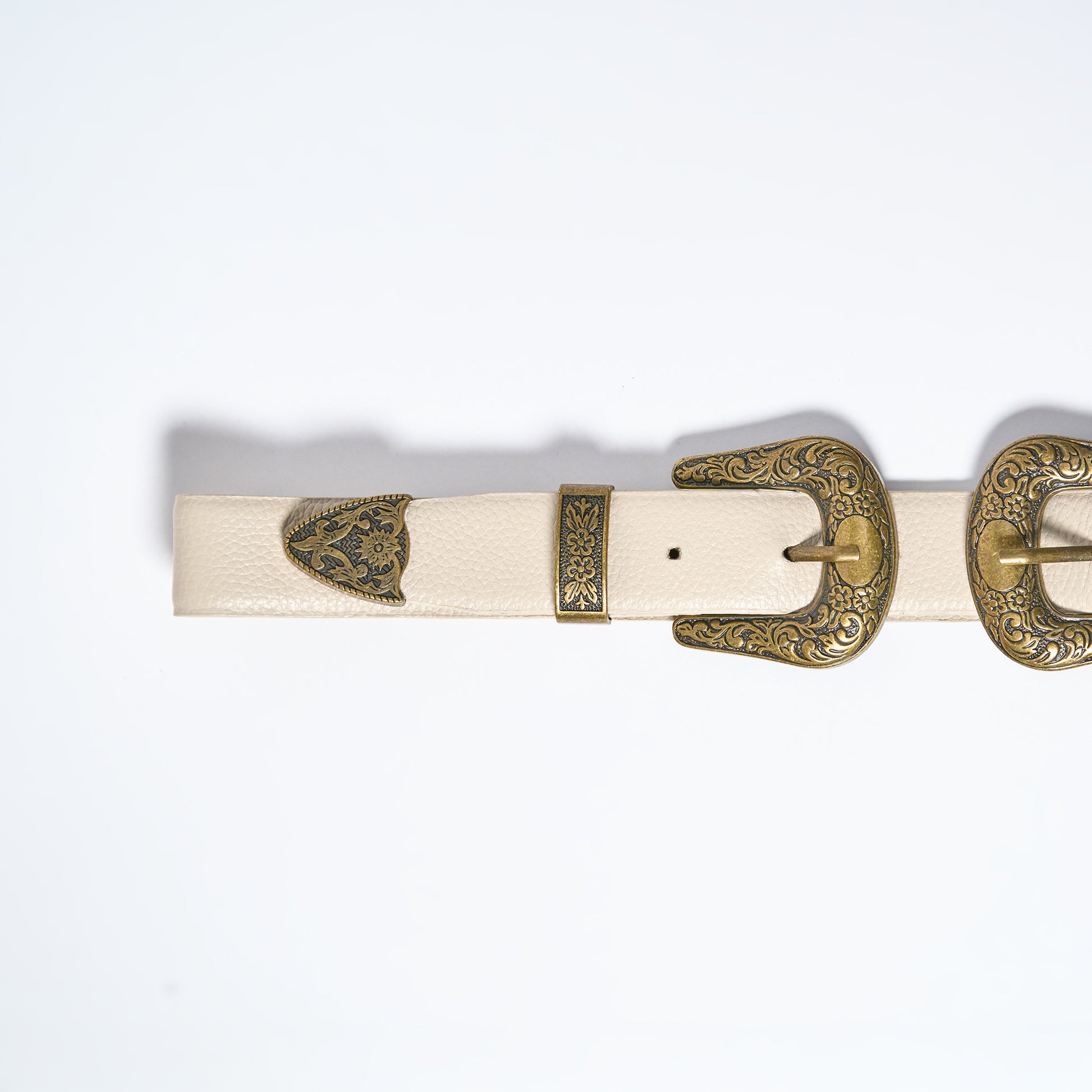 White belt with gold buckles on a white background