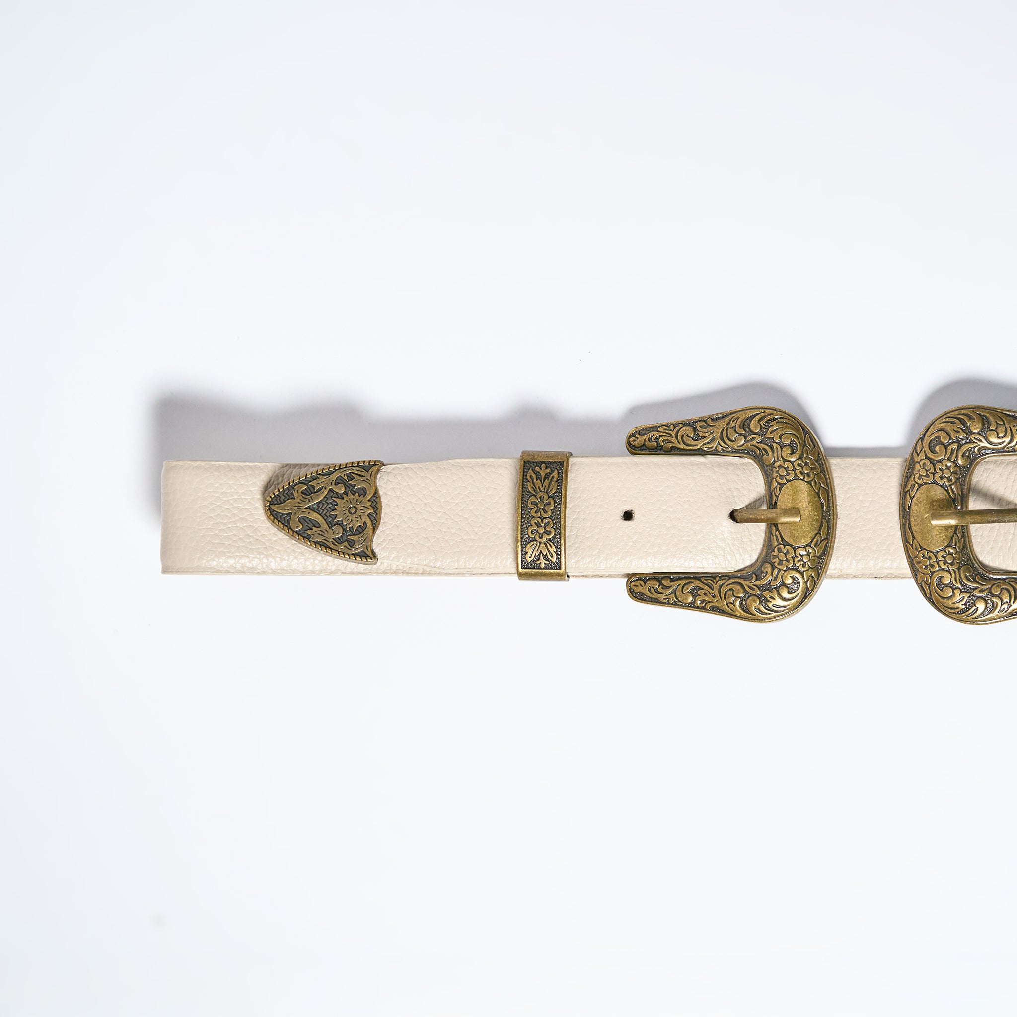White belt with gold buckles on a white background
