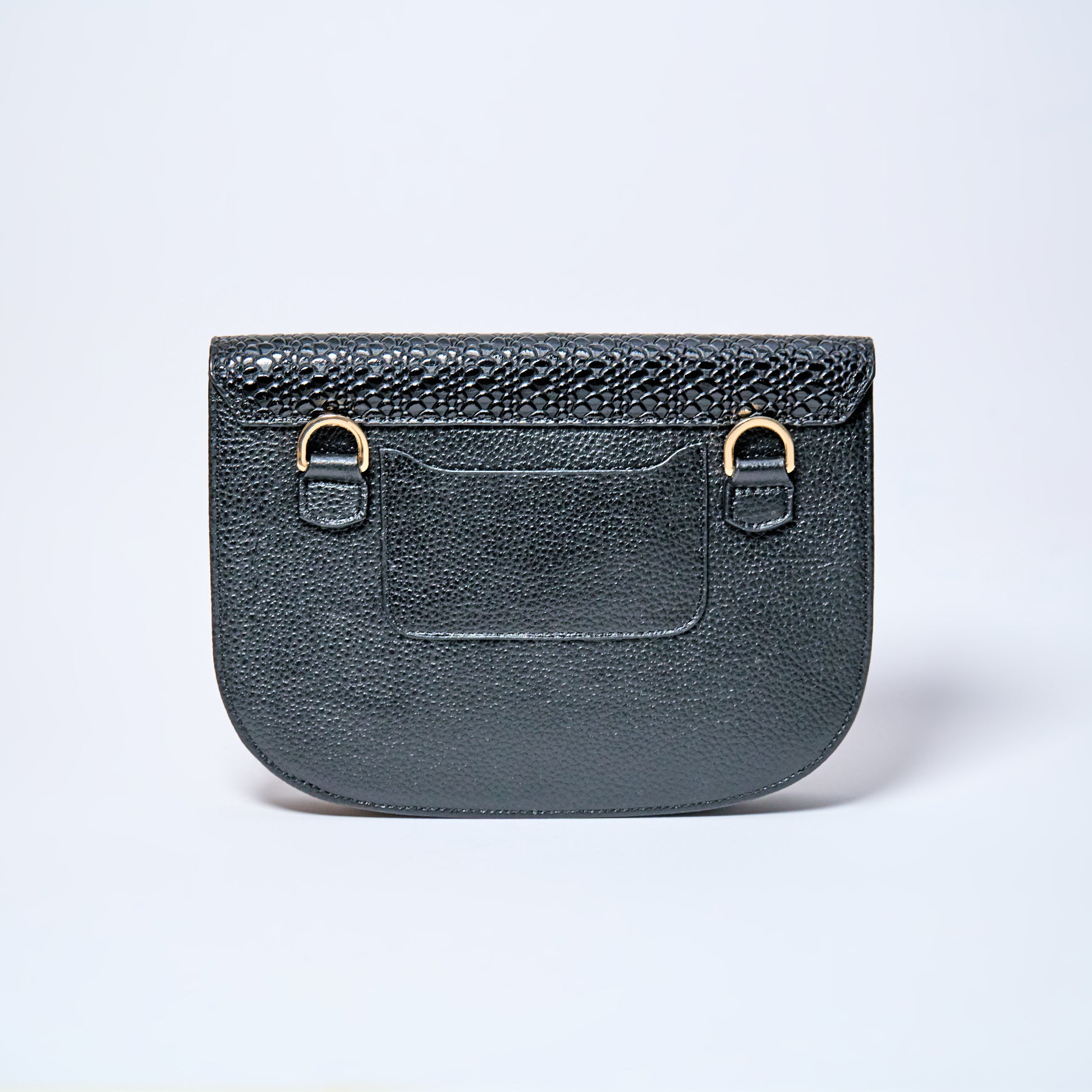 Lyra convertible leather crossbody bag in Black Onyx with adjustable strap, can be worn as a shoulder bag, crossbody, or belt bag. Handcrafted by Oda Nova