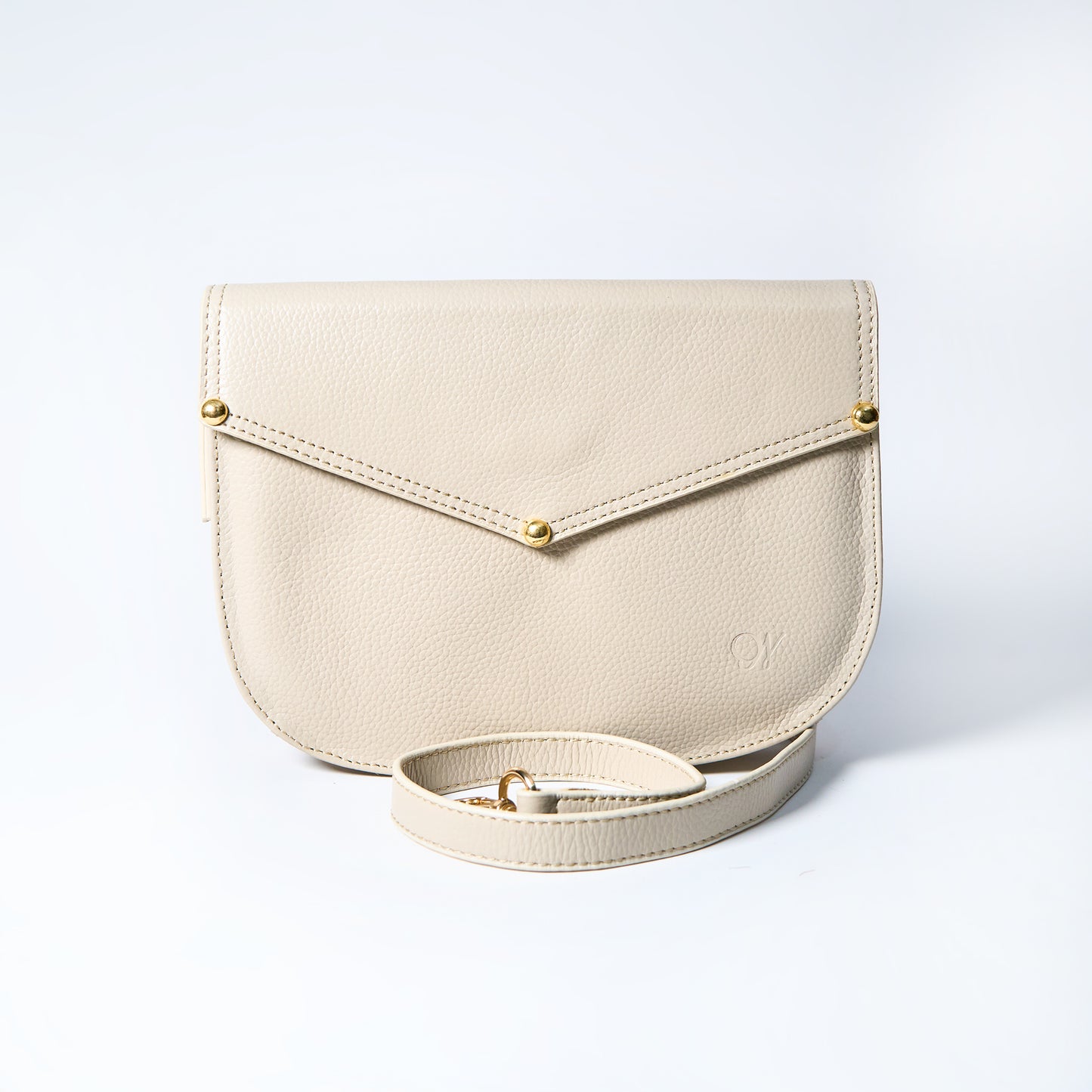 Lyra convertible leather crossbody bag in Cream with adjustable strap, can be worn as a shoulder bag, crossbody, or belt bag. Handcrafted by Oda Nova
