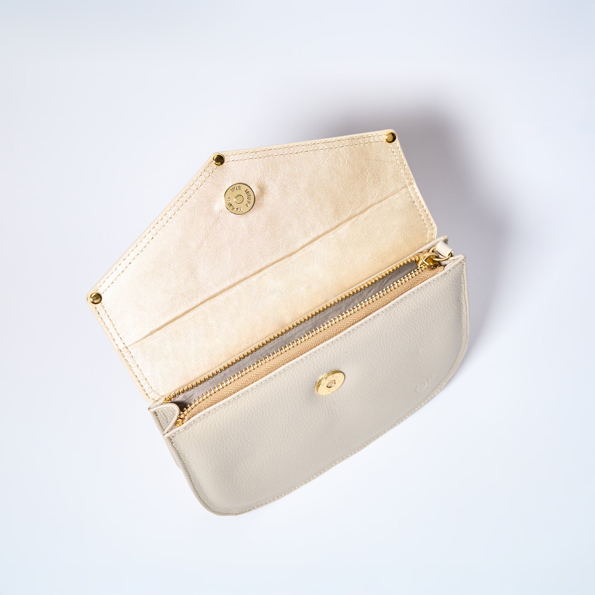 Lyra convertible leather crossbody bag interior in Cream with adjustable strap, can be worn as a shoulder bag, crossbody, or belt bag. Handcrafted by Oda Nova