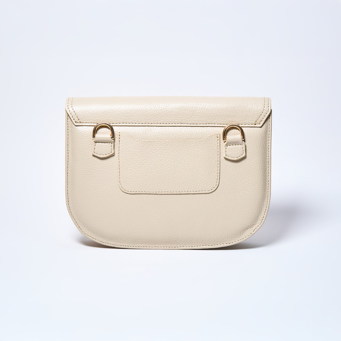 Lyra convertible leather crossbody bag backside in Cream with adjustable strap, can be worn as a shoulder bag, crossbody, or belt bag. Handcrafted by Oda Nova