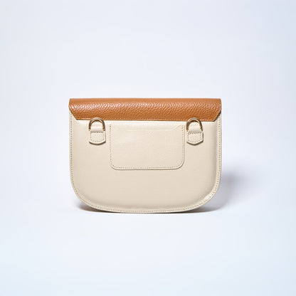 Backside of Lyra convertible leather crossbody bag in Honey Brown & Cream with adjustable strap, can be worn as a shoulder bag, crossbody, or belt bag. Handcrafted by Oda Nova