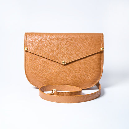 Lyra convertible leather crossbody bag in Honey Brown with adjustable strap, can be worn as a shoulder bag, crossbody, or belt bag. Handcrafted by Oda Nova