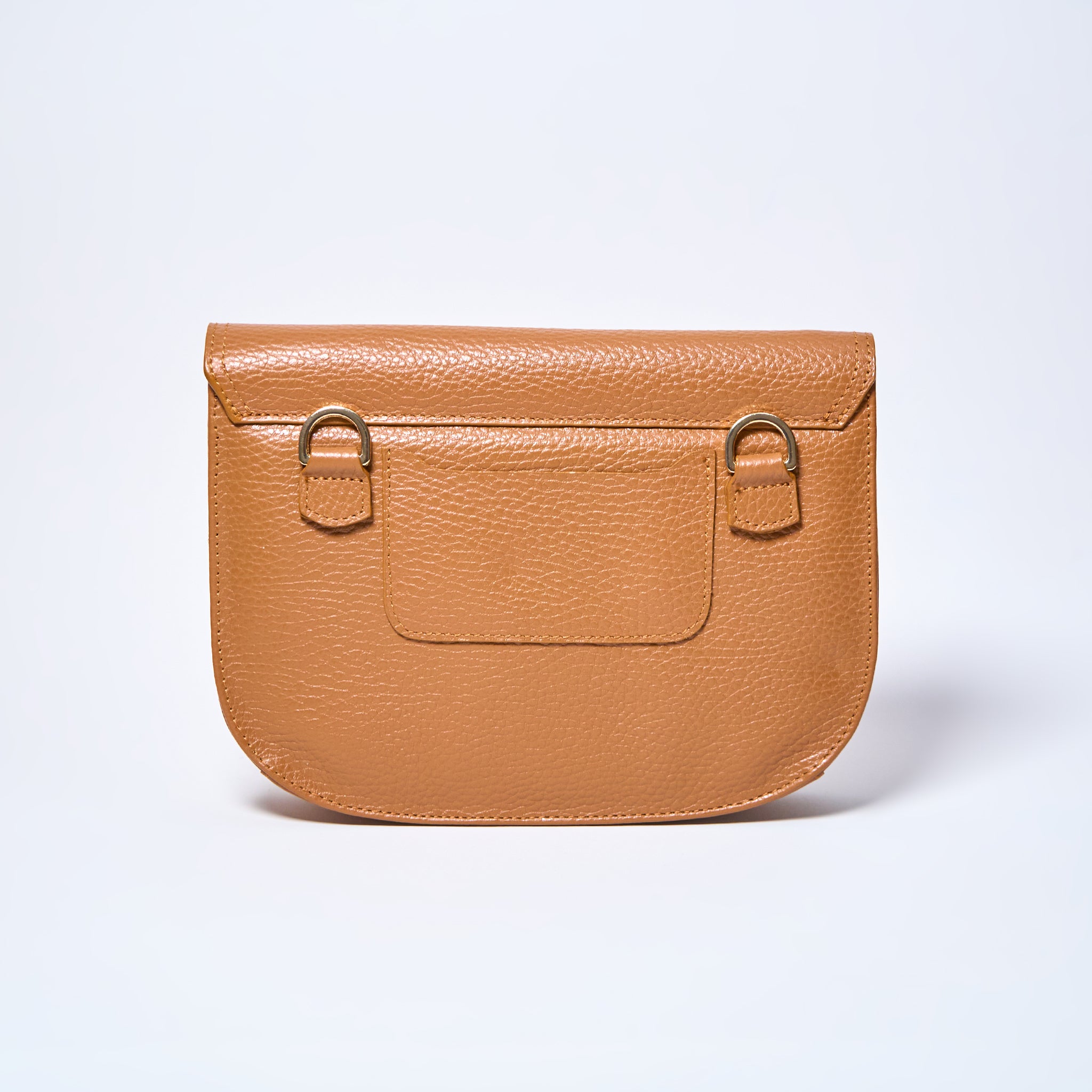 Backside Lyra convertible leather crossbody bag in Honey Brown with adjustable strap, can be worn as a shoulder bag, crossbody, or belt bag. Handcrafted by Oda Nova