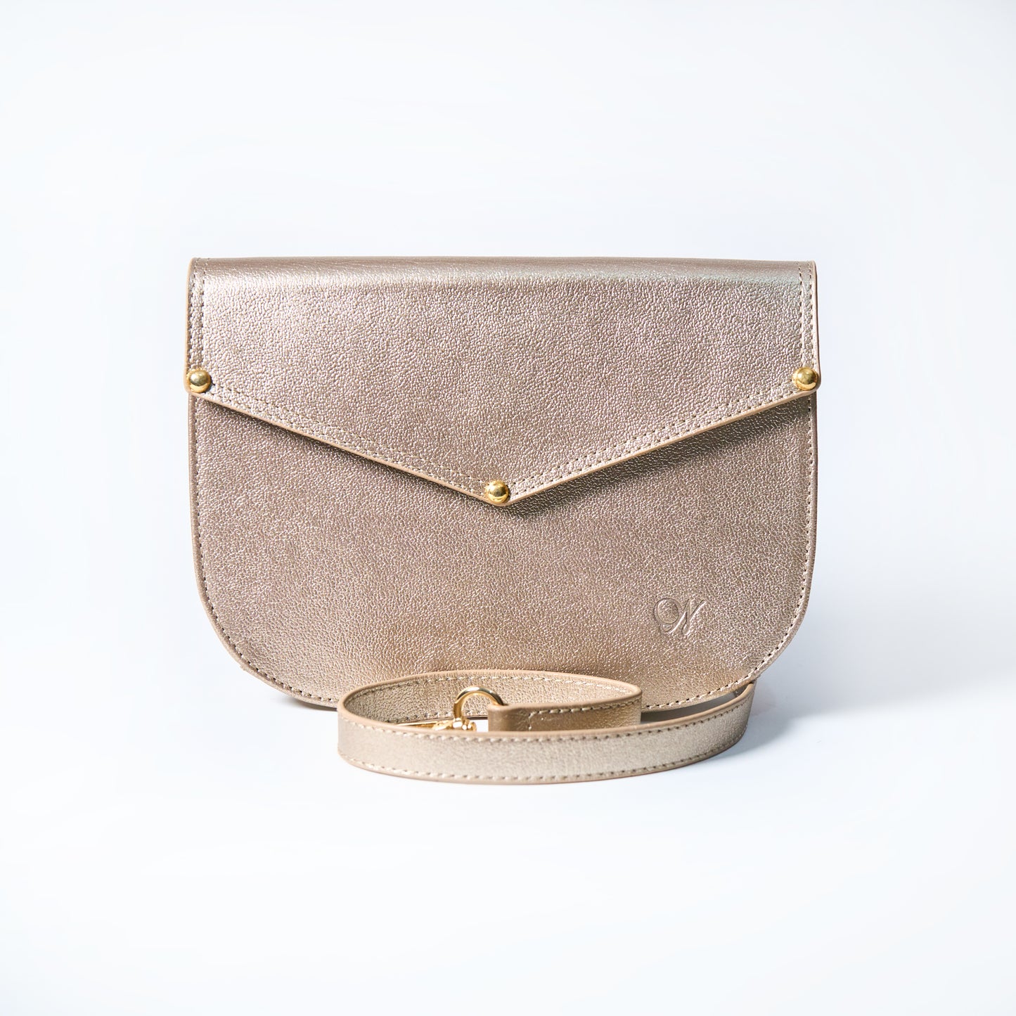 Lyra convertible leather crossbody bag in Stardust Gold with adjustable strap, can be worn as a shoulder bag, crossbody, or belt bag. Handcrafted by Oda Nova