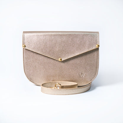 Lyra convertible leather crossbody bag in Stardust Gold with adjustable strap, can be worn as a shoulder bag, crossbody, or belt bag. Handcrafted by Oda Nova