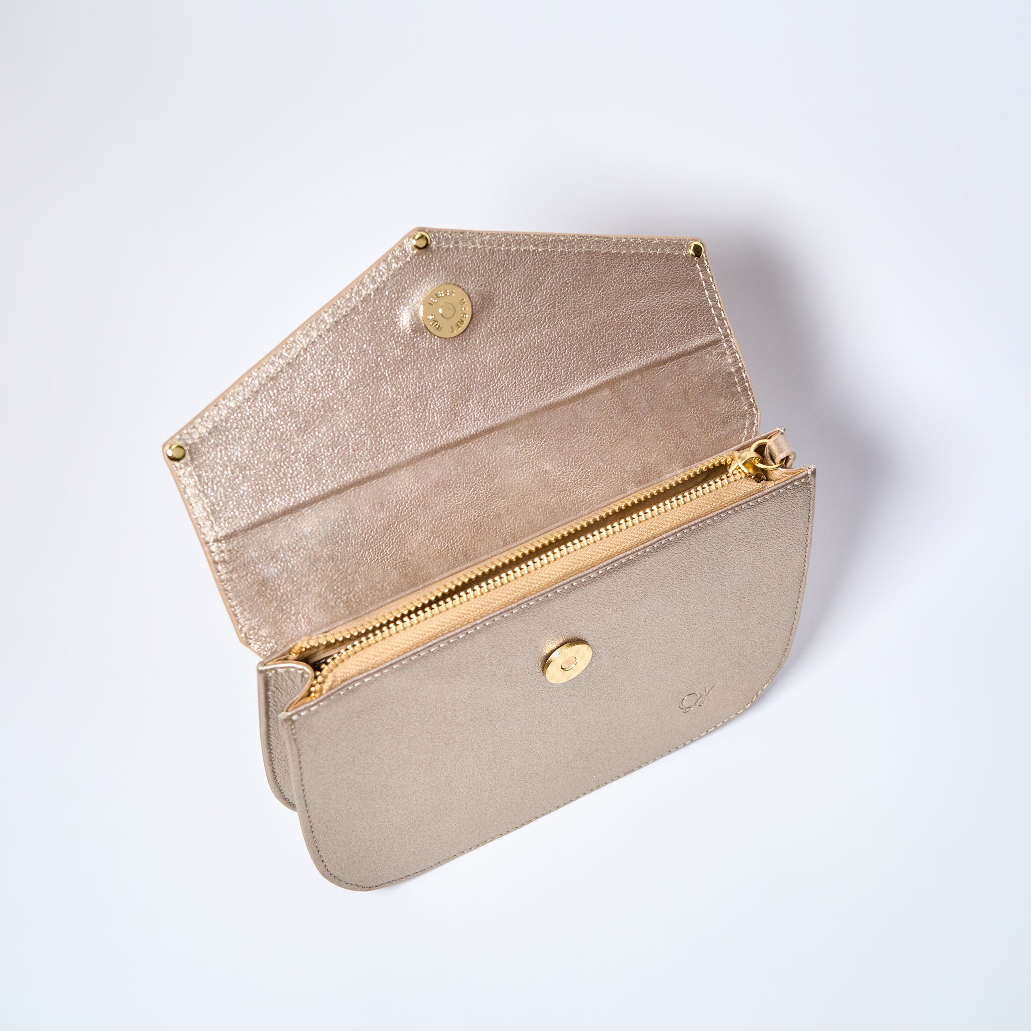 Lyra convertible leather crossbody bag in Stardust Gold with adjustable strap, can be worn as a shoulder bag, crossbody, or belt bag. Handcrafted by Oda Nova