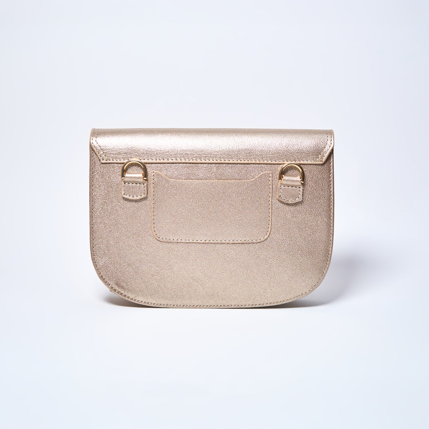 Lyra convertible leather crossbody bag in Stardust Gold with adjustable strap, can be worn as a shoulder bag, crossbody, or belt bag. Handcrafted by Oda Nova