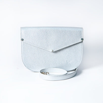 Lyra convertible leather crossbody bag in Stardust Grey with adjustable strap, can be worn as a shoulder bag, crossbody, or belt bag. Handcrafted by Oda Nova