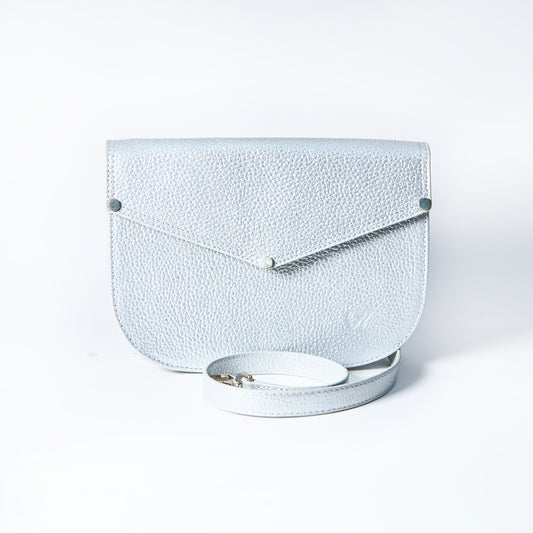 Lyra convertible leather crossbody bag in Stardust Grey with adjustable strap, can be worn as a shoulder bag, crossbody, or belt bag. Handcrafted by Oda Nova