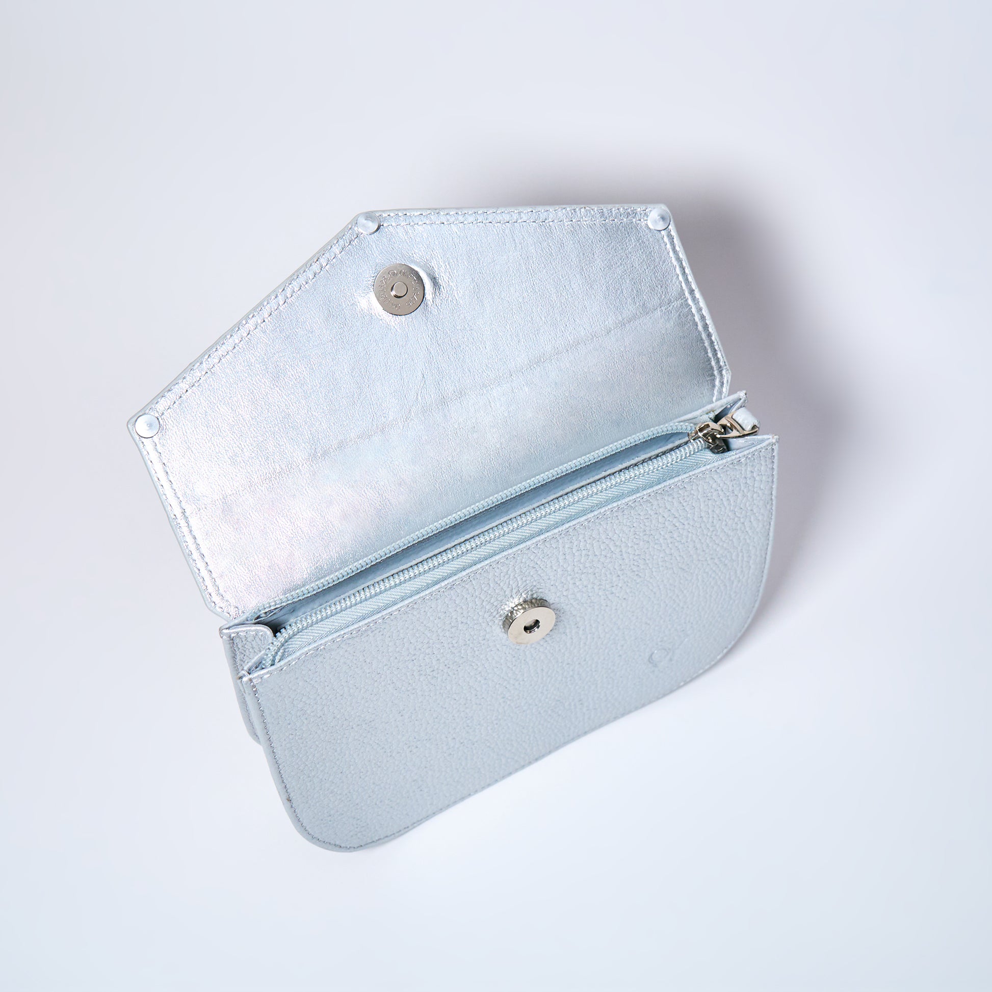 Lyra convertible leather crossbody bag in Stardust Grey with adjustable strap, can be worn as a shoulder bag, crossbody, or belt bag. Handcrafted by Oda Nova