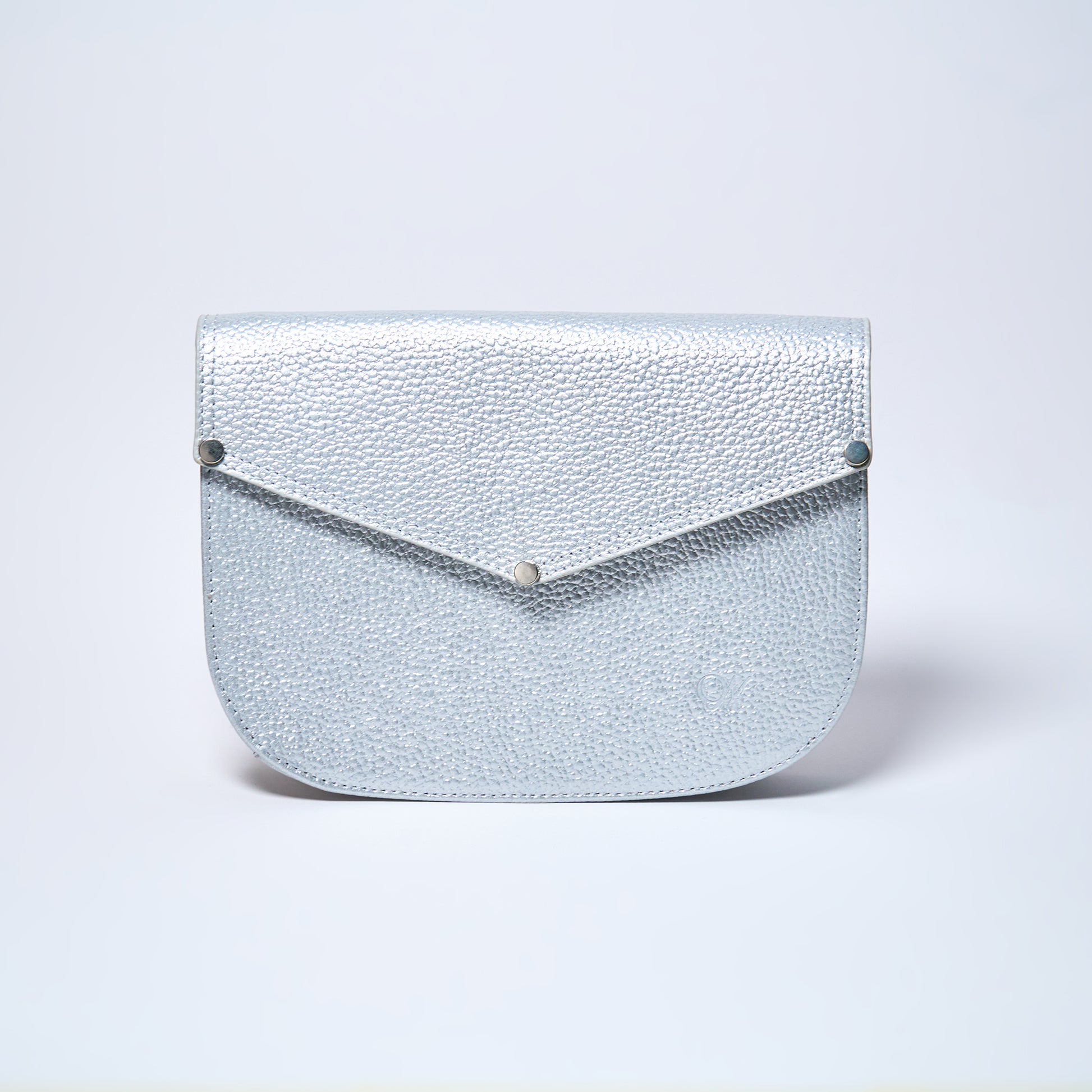 Lyra convertible leather crossbody bag in Stardust Grey with adjustable strap, can be worn as a shoulder bag, crossbody, or belt bag. Handcrafted by Oda Nova