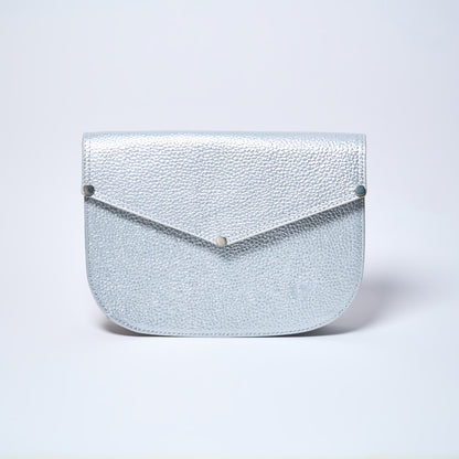 Lyra convertible leather crossbody bag in Stardust Grey with adjustable strap, can be worn as a shoulder bag, crossbody, or belt bag. Handcrafted by Oda Nova