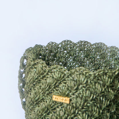 Close-up Solstice handcrafted crossbody bag made from natural fique fiber in beige, designed by Oda Nova with ancestral Colombian techniques